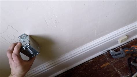 electrical boxes for plaster walls|cutting electrical box into plaster.